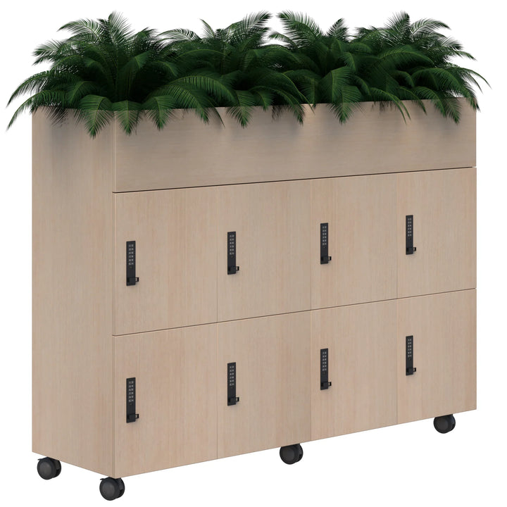 The Mascot Lockers by Home Office Space NZ is a light wood mobile cabinet with two rows of customizable lockers, black handles, combination locks, and a rectangular planter with lush green foliage on top.